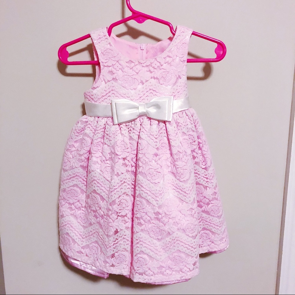 Pink lace toddler dress with ivory bow sz 12 mo.